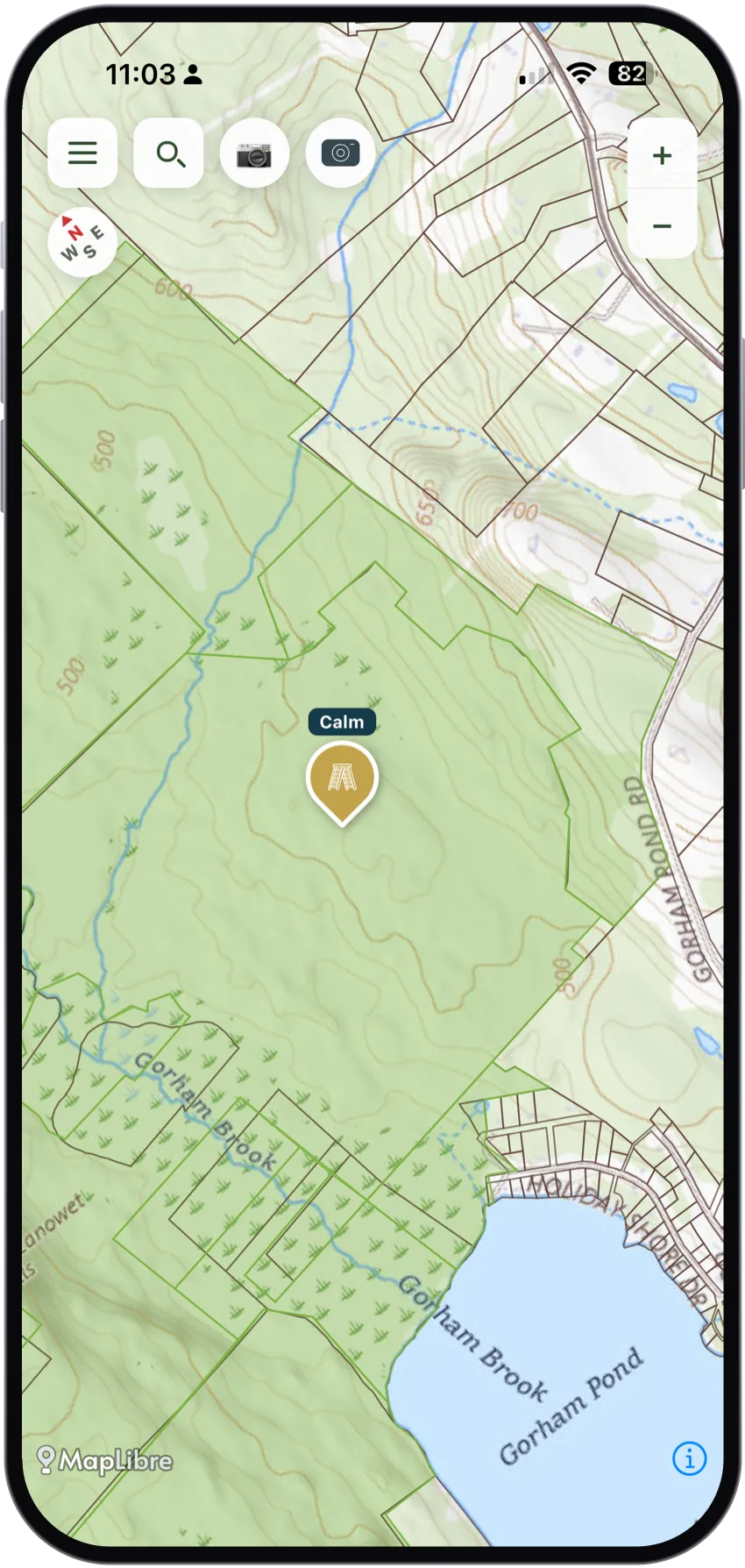 A stand marker on a topo map with a Calm wind label above it.